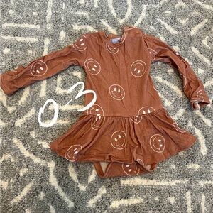 Blush Lotus Smile Skirted Onesie